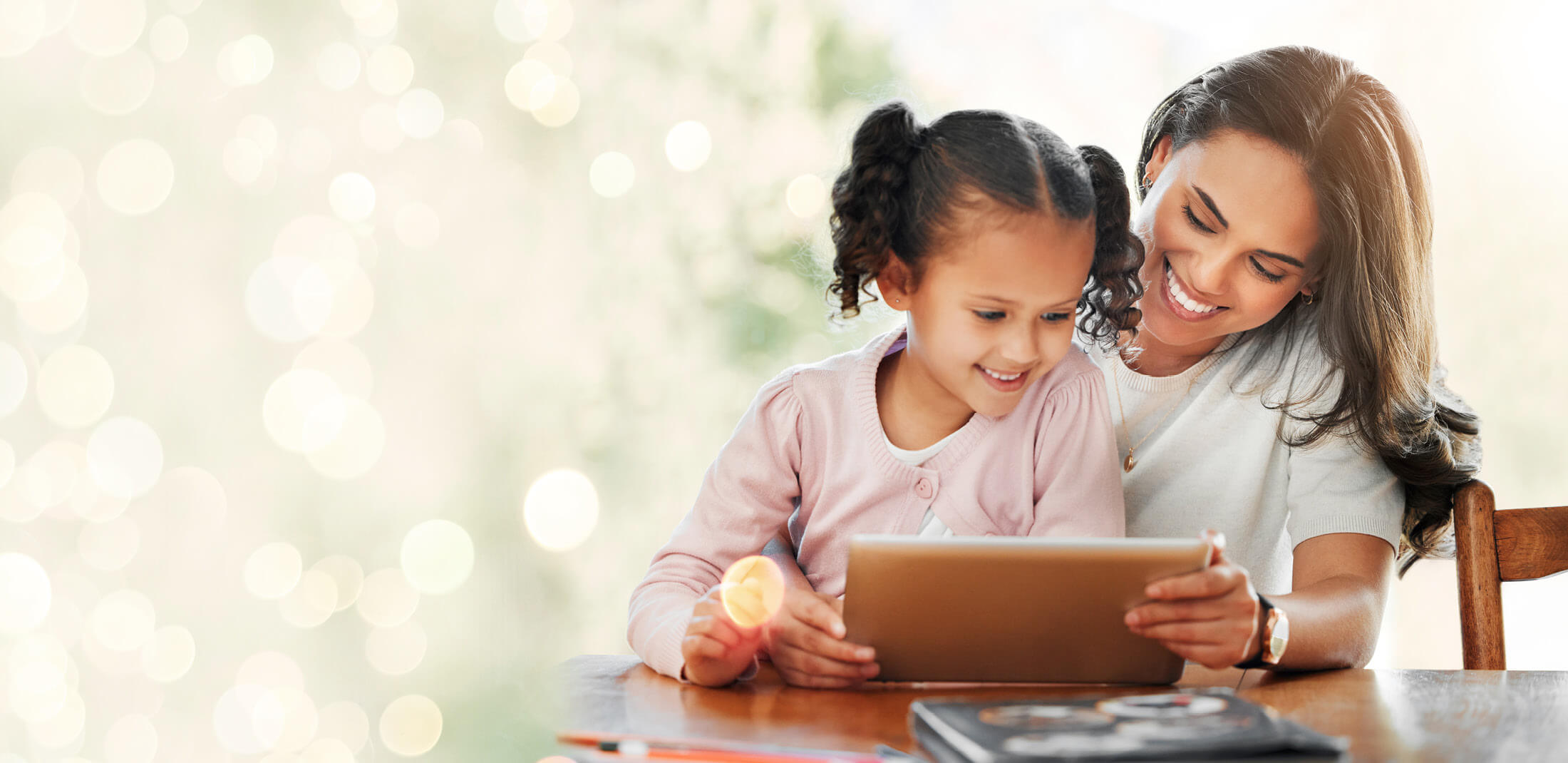 A mother and child smiling